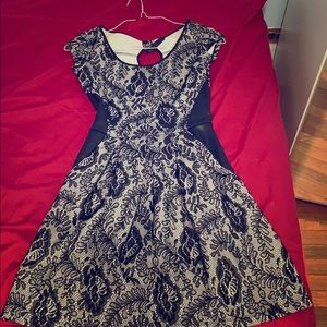 Timeless black and white lace dress with pockets!